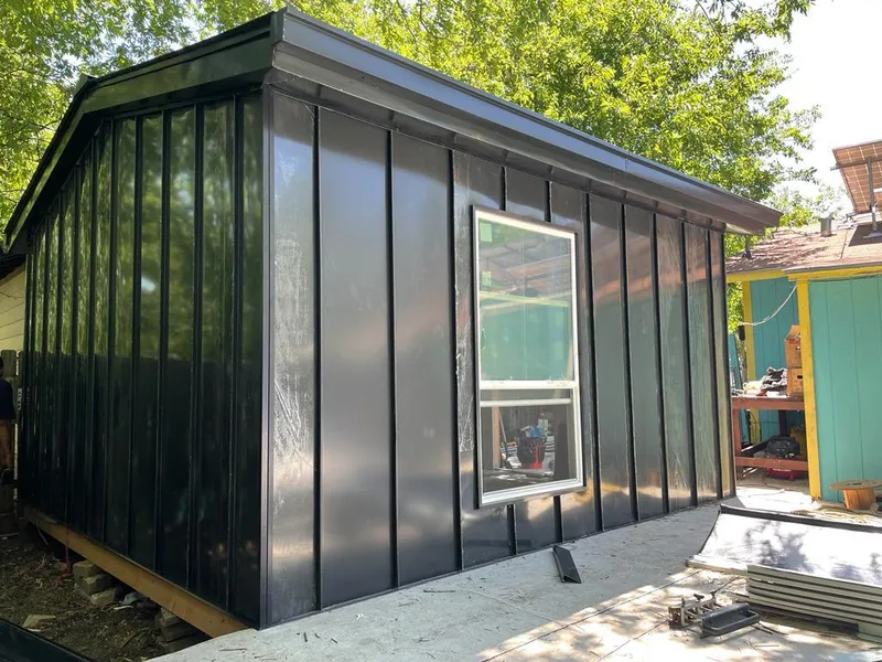 Black standing seam metal wall panels for Metal Roof Installation in Hurricane